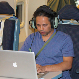Sachindev Shenoy (SOFIA Associate Scientist) reducing data during the supernova observation flights
