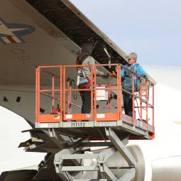 SOFIA technicians carefully remove parts from inside the YAL-1’s number one engine pylon