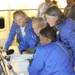 Airborne Astronomy Ambassadors at the educators' work station on SOFIA